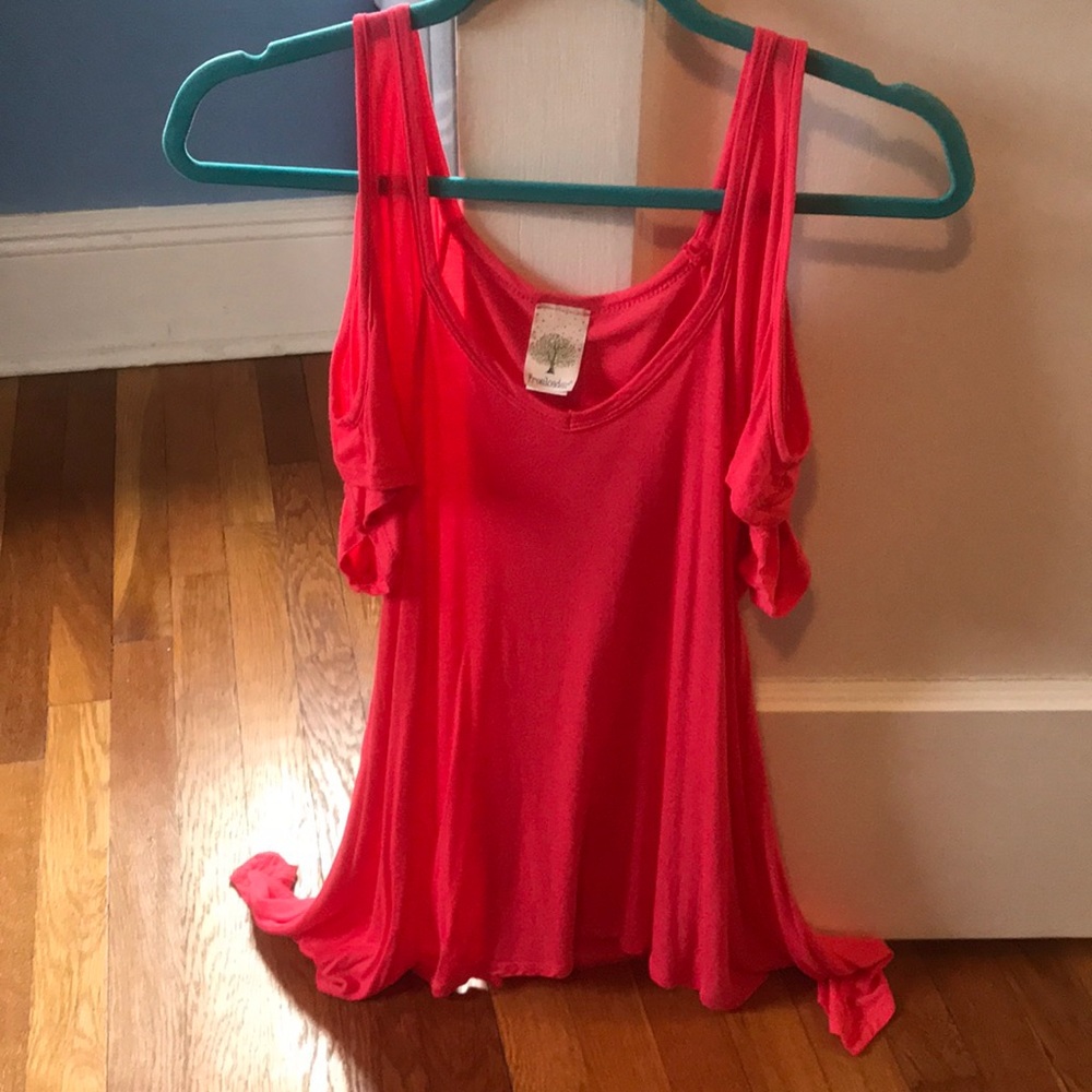Coral colored tunic top with shoulder cut outs
